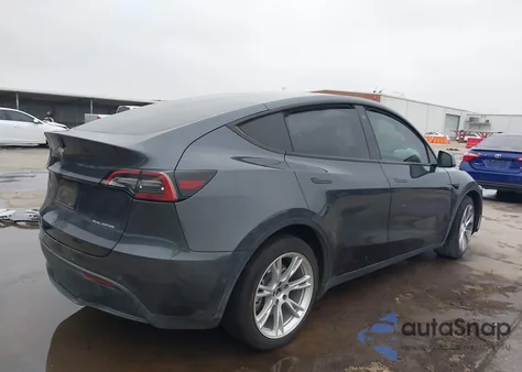 2022 Tesla Model Y Long Range Dual Motor All-Wheel Drive z USA, uszkodzony, nr VIN 7SAYGDEE8NF417890